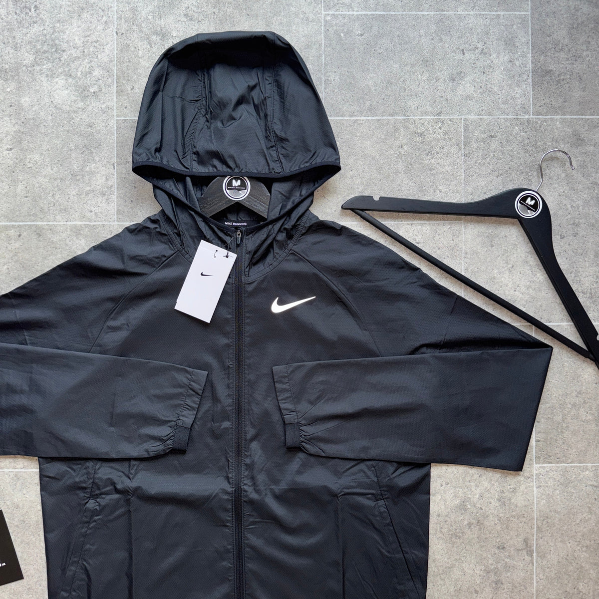 NIKE ESSENTIALS JACKET - BLACK